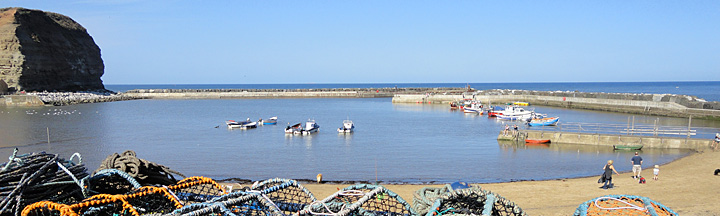 Staithes is a traditional fishing village with a sheltered harbour (Copyright - Go North Yorkshire) Photo of the traditional fishing village of Staithes in North Yorkshire