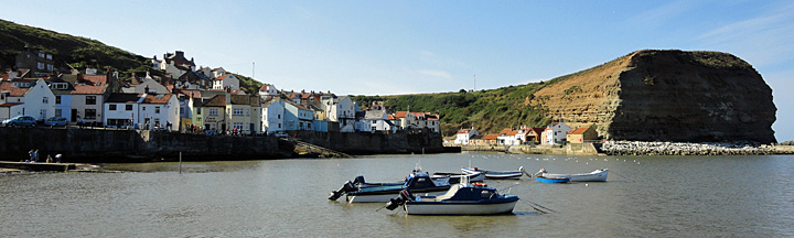 View over Staithes harbour to the village (Copyright - Go North Yorkshire) View over Staithes harbour